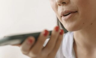 woman recording a voice note