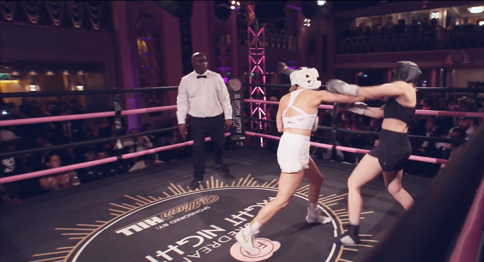 two girls boxing in boxing ring at fight night 4