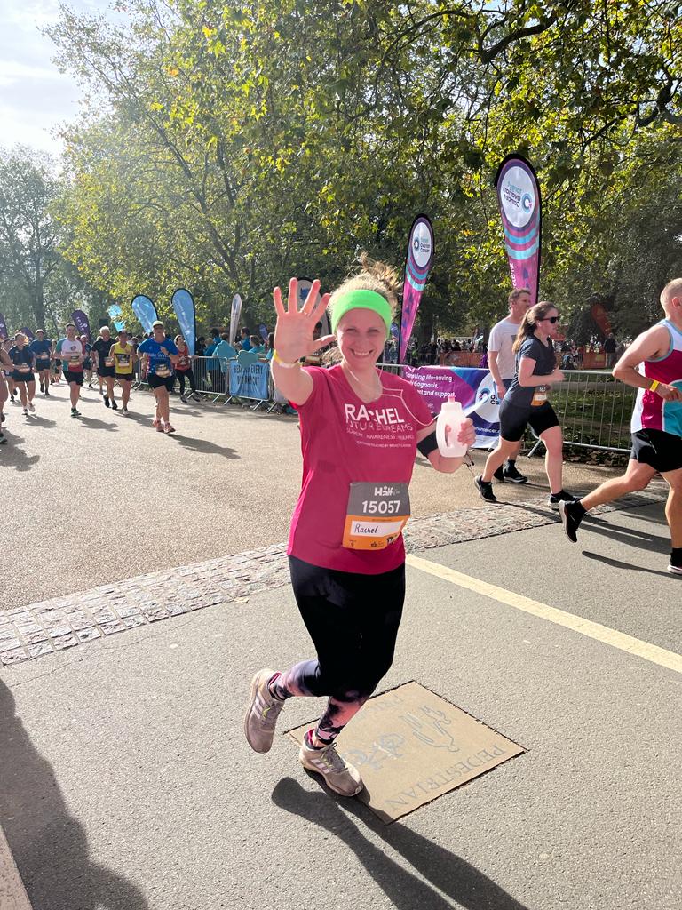 A runner finishing the Royal Parks Half Marathon to raise money for Future Dreams breast cancer charity