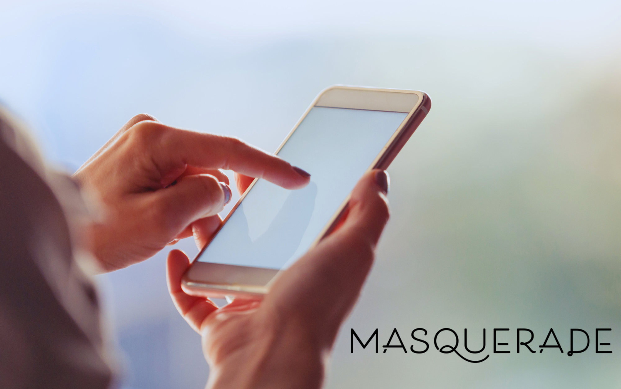 Image of person swiping on phone with masquerade logo