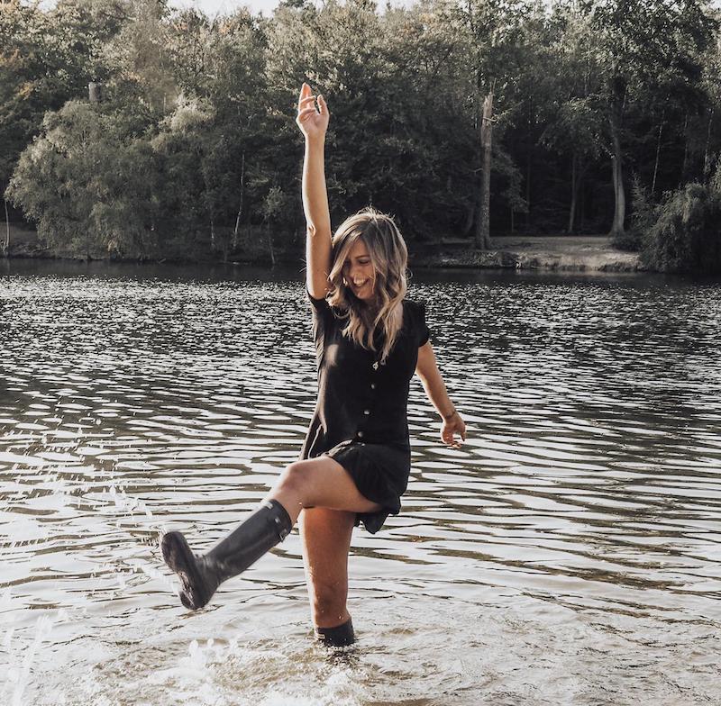 Nicky Newman kicking up water in a lake