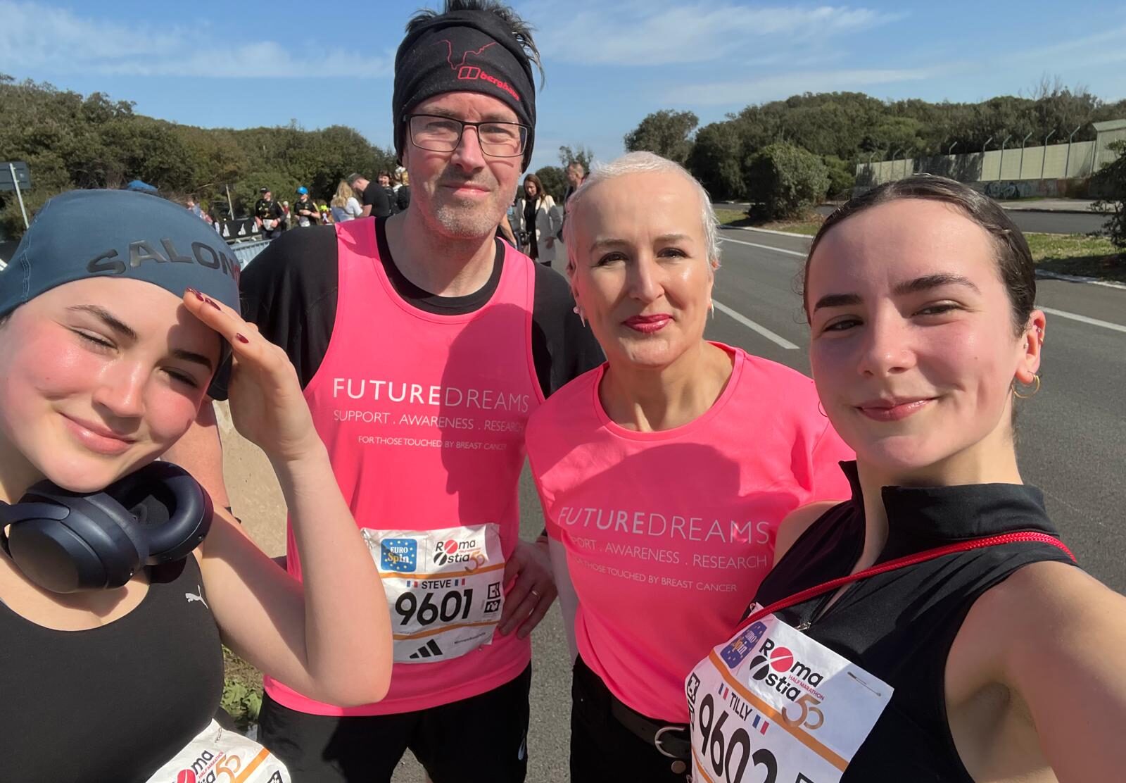 Harriet and family with husband and daughters at roma marathon